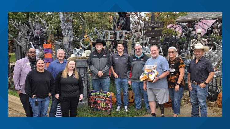 Harker Heights Halloween Yard of the Month display with tombstones and decorations